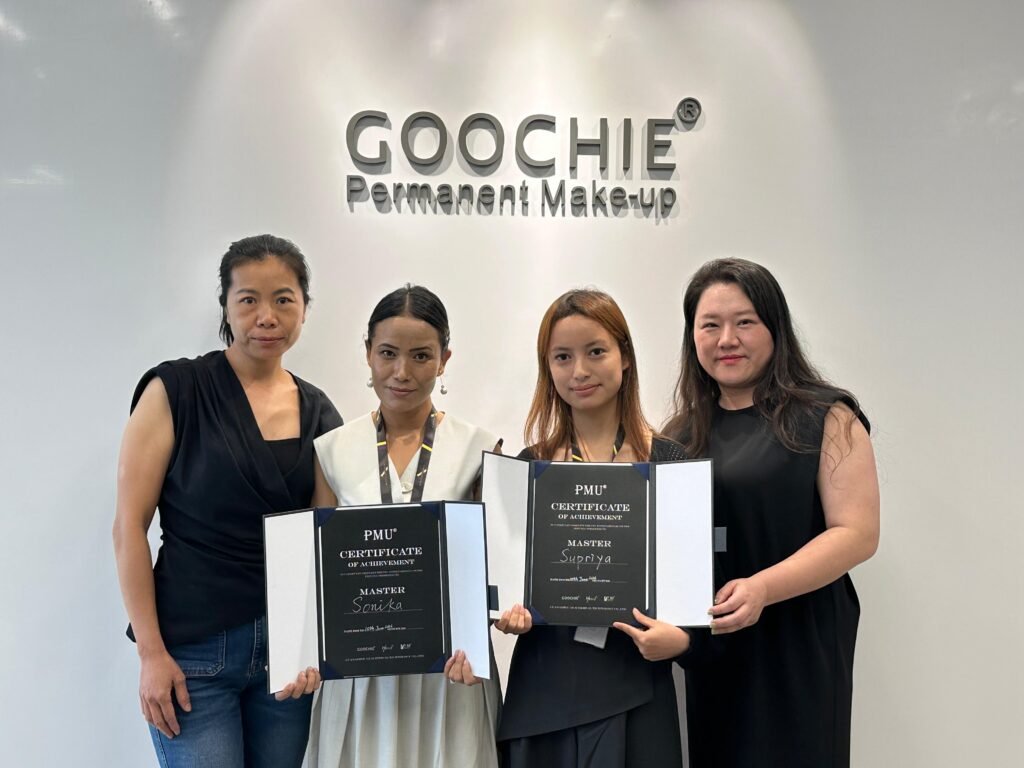Supriya KC and Sonika Lama KC of Artistry Academy receiving Master certificates at Goochie Permanent Make-up headquarters in China